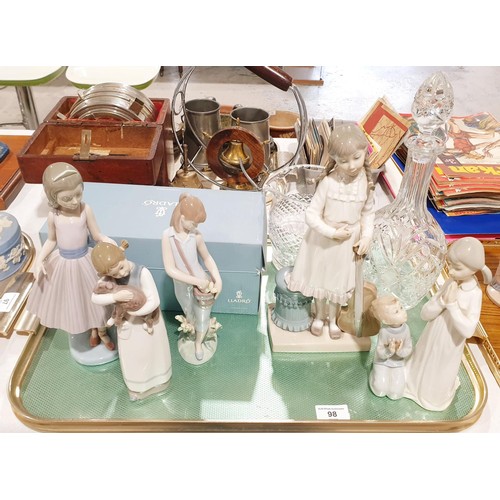 98 - A Lladro figure of a boy and girl praying, height 21cm together with four other Lladro figures, each... 