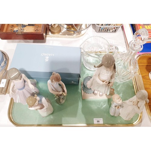 98 - A Lladro figure of a boy and girl praying, height 21cm together with four other Lladro figures, each... 