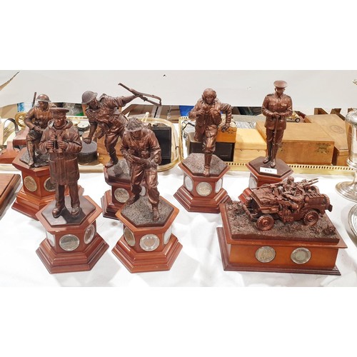 115 - Seven Danbury Mint resin bronze effect World War I and World War II figures, two A/F, the tallest 33... 