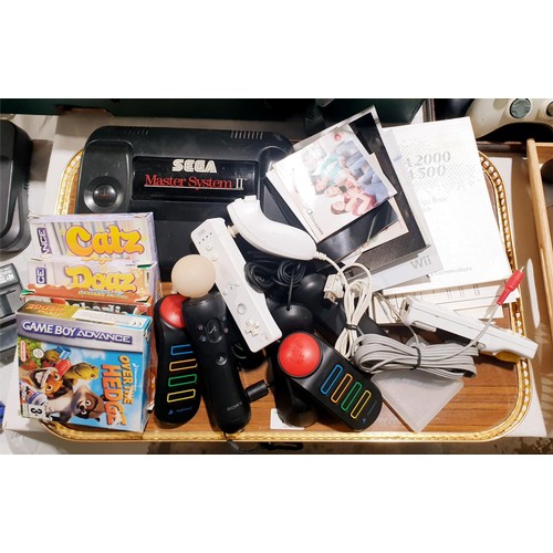 134 - A Sega Master System II console, Gameboy advance games and assorted game console accessories. No shi... 