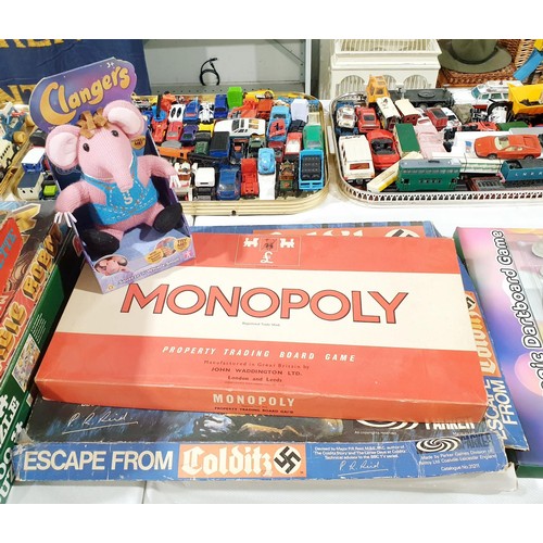 145 - An early edition of Escape from Colditz, instructions missing, Monopoly and two soft toys. No shippi... 