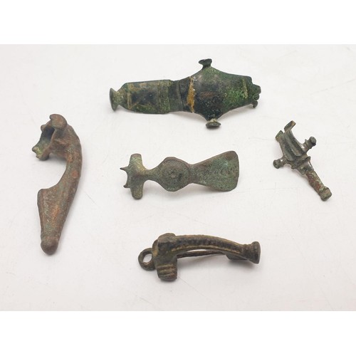 175 - Five ancient Roman bronze brooches. No international shipping.