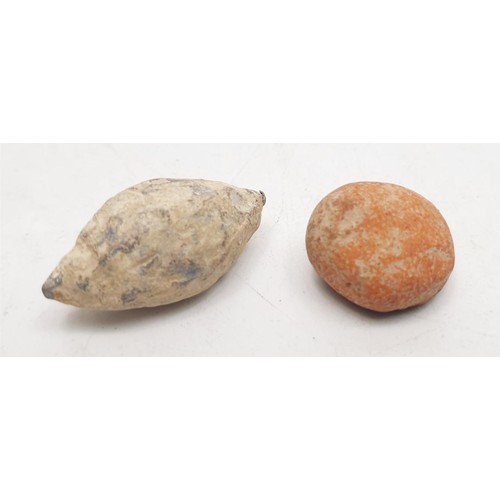 178 - A metal Roman sling shot, length 4cm together with a Roman terracotta artifact. No shipping. Arrange... 