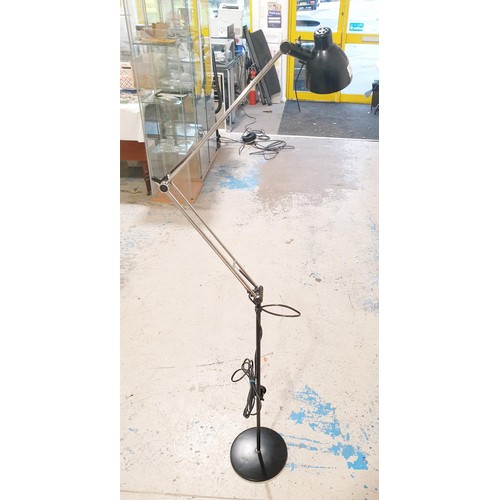 200 - An adjustable floor standing reading lamp. No shipping. Arrange collection or your own packer and sh... 