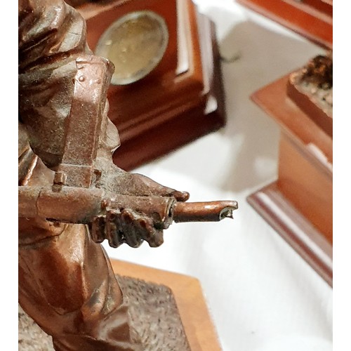 115 - Seven Danbury Mint resin bronze effect World War I and World War II figures, two A/F, the tallest 33... 