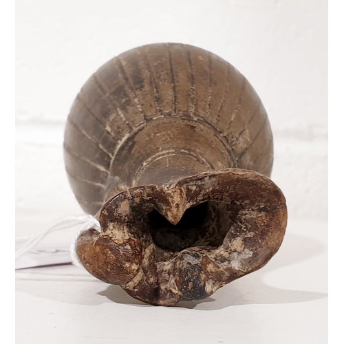 154 - An ancient ceramic Apulian/Greek Oinochoe, having ribbed body and trefoil mouth, height 13cm. No shi... 