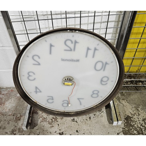 152 - A large National electric wall clock in a copper bezel, diameter 71cm. No shipping. Arrange collecti... 