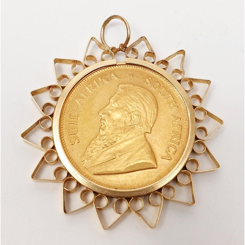 30 - South Africa: a 1 ounce Krugerrand coin in a 9ct gold pendant mount, length 5cm, total weight 40.41g... 