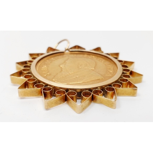 30 - South Africa: a 1 ounce Krugerrand coin in a 9ct gold pendant mount, length 5cm, total weight 40.41g... 