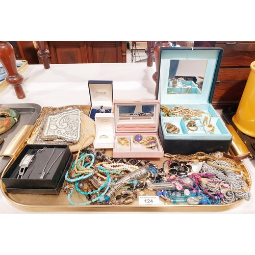 124 - Costume jewellery and vintage evening purses. In house shipping available excluding the United State... 
