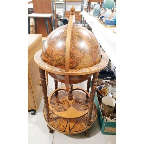 159 - A globe drinks table, height 80cm. No Shipping. Arrange collection or your own packer and shipper, p... 