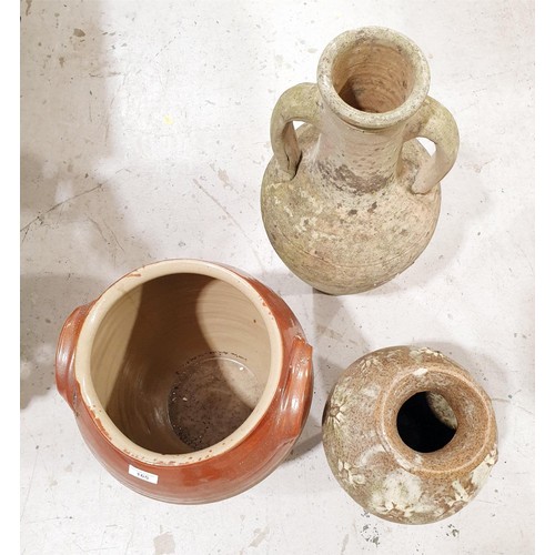 165 - A terracotta garden amphora, height 60cm, a ceramic vase, A/F and a large earthenware crock. No Ship... 