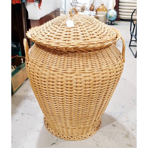 169 - A wicker linen bin, height 66cm. No Shipping. Arrange collection or your own packer and shipper, ple... 