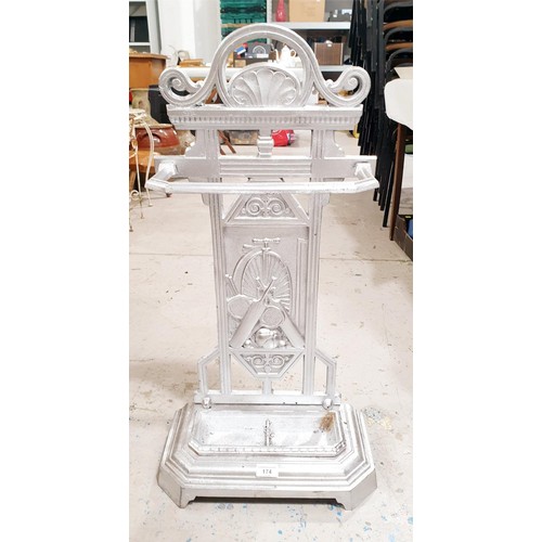 174 - A vintage cast iron umbrella stand with a sporting motif, height 77cm. No Shipping. Arrange collecti... 