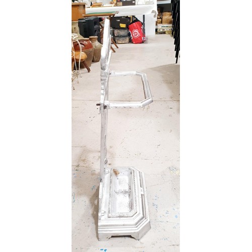 174 - A vintage cast iron umbrella stand with a sporting motif, height 77cm. No Shipping. Arrange collecti... 