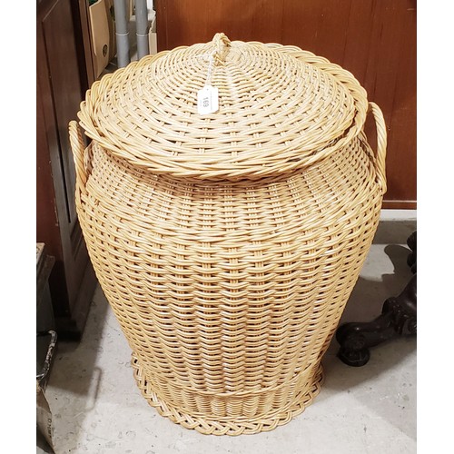 169 - A wicker linen bin, height 66cm. No Shipping. Arrange collection or your own packer and shipper, ple... 