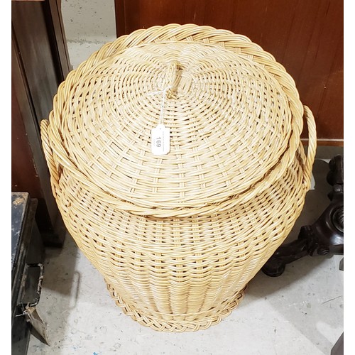 169 - A wicker linen bin, height 66cm. No Shipping. Arrange collection or your own packer and shipper, ple... 