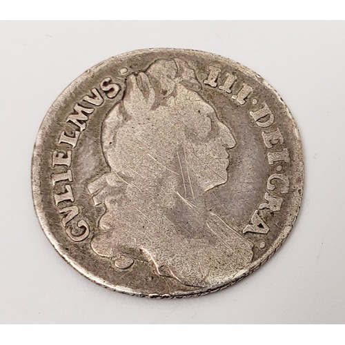 49 - William III: a silver sixpence, 1696, G. UK shipping £15, we combine lots for shipping. No shipping ... 