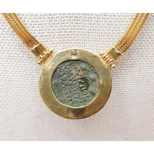 8 - A 14ct gold necklace set with an ancient Greek bronze coin, length 41cm, gross weight 29.33g. In hou... 