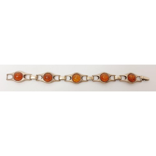 22 - A 925 silver and amber bracelet, length 19cm, gross weight 27g. In house shipping available.