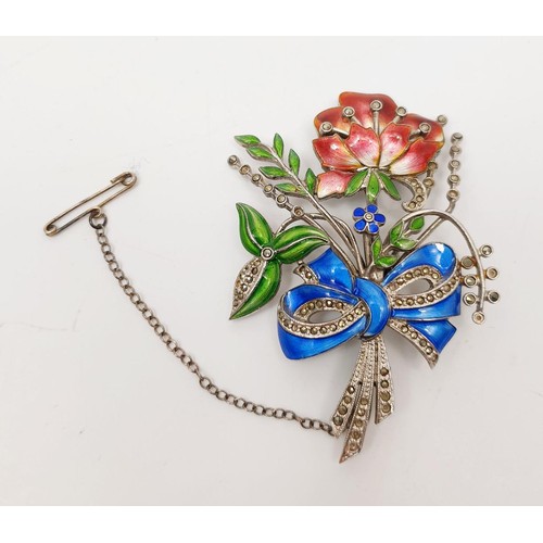 23 - A white metal and enamel brooch in the form of a flower set with marcasite A/F, gross weight 23g. In... 