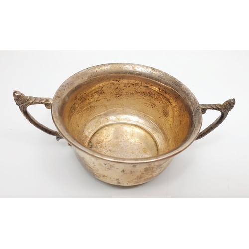 30 - A hallmarked silver twin handled bowl with acorn motifs, width 14.5cm, weight 109g, Birmingham 1902.... 