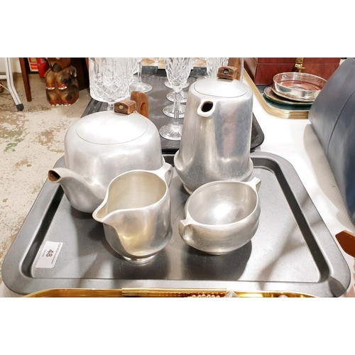 48 - A four piece Picquot  ware tea set. No shipping. Arrange your own packer and shipper, please.