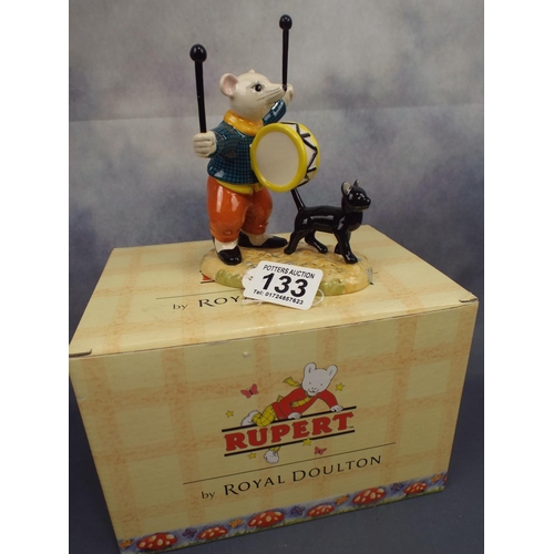 133 - Royal Doulton Rupert Bear figure,' Banging on a drum' boxed and as new.