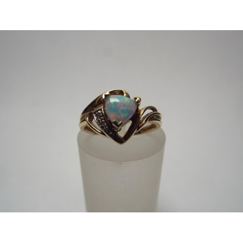 60 - 9ct Gold ring set with Opal & Diamonds. 2.3g   Finger size 'O'