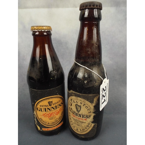 221 - Two Vintage Guinness bottles, unopened.