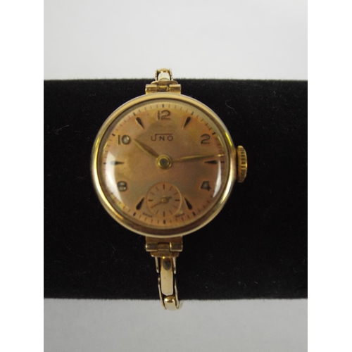 113 - 9ct gold ladies swiss watch, 9ct Gold case and expanding strap. Working order. Maker, UNO.