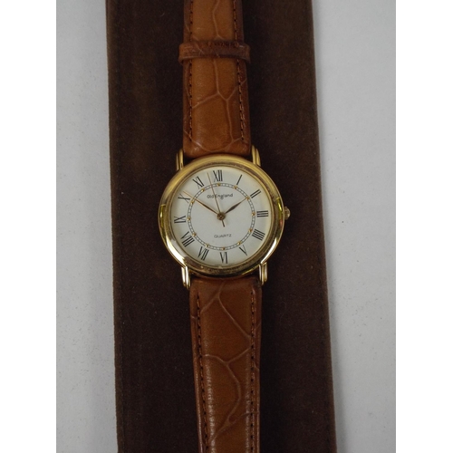 116 - Gents Quartz watch with leather strap & suede case. Requires battery