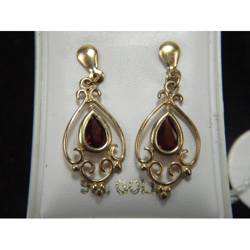 46 - Pair of 9ct gold Garnet set drop earrings