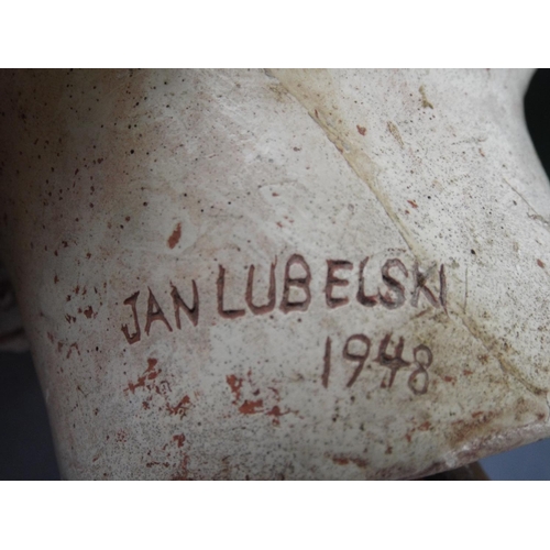 167 - Plaster Bust of a young woman. Signed and dated Jan Lubelski 1948 exhibited at the Glasgow RIFA 1948