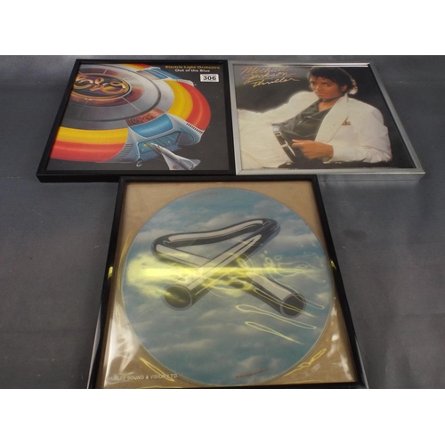 306 - Three framed LP record sleeves