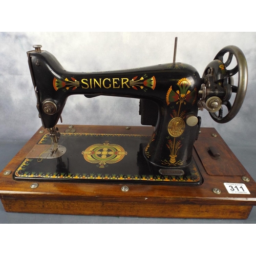 311 - Antique singer sewing machine, serial number for 1910, converted to electricity