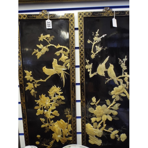 335 - Two oriental laquered gilded screens