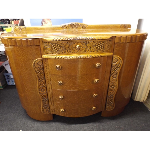 374 - 1930's Dresser with ornate carving, Four Drawers and two wing cupboards in excellent order