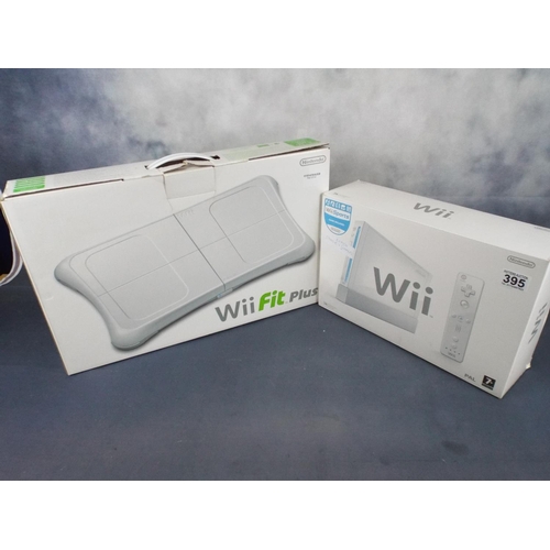 395 - Boxed Wii Sports console plus Wii Fit floor dance pad