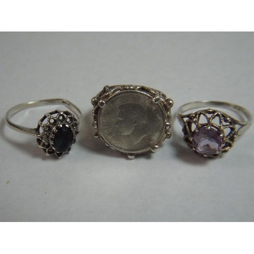 44 - Three silver Rings, Two stone set, one with a sixpence.