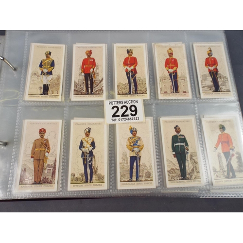 229 - Large Leatherette bound album of various sets of Vintage Cigarette cards.