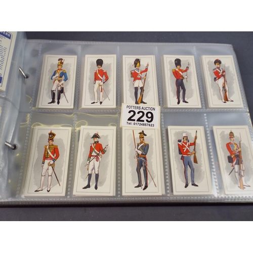 229 - Large Leatherette bound album of various sets of Vintage Cigarette cards.