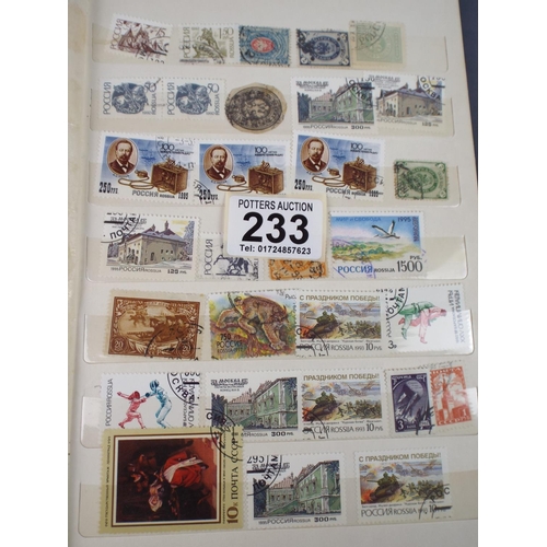 233 - Album of Russian and Latvian used and Mint stamps.