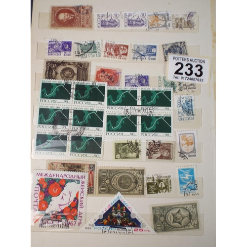 233 - Album of Russian and Latvian used and Mint stamps.