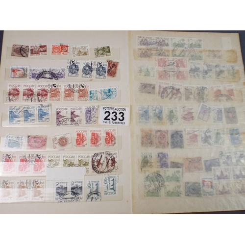 233 - Album of Russian and Latvian used and Mint stamps.