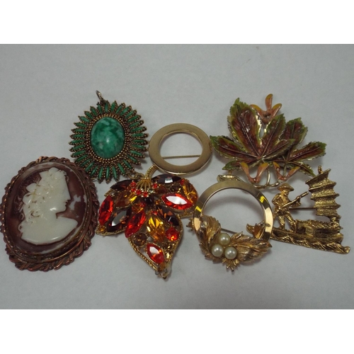 54 - Selection of Excellent Quality costume Brooches and pendants by designer makers