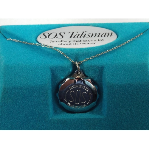 57 - SOS Talisman locket and necklace with original box.