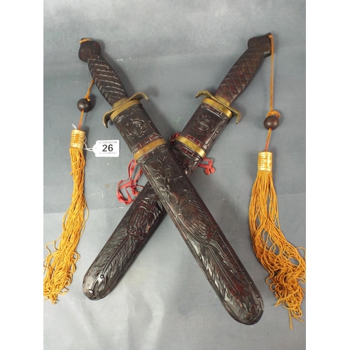 26 - Pair of Oriental martial arts Knives with Decorative scabbbards.