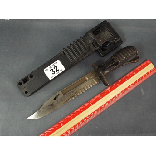 32 - Present Day SA80 Bayonet with metal Scabbard and Belt Clip Bracket.