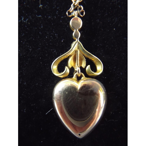 44 - Victorian 9ct Gold Heart shaped Pendant encrusted with Seed Pearls. On 18 ' chain, No hallmarks but ... 